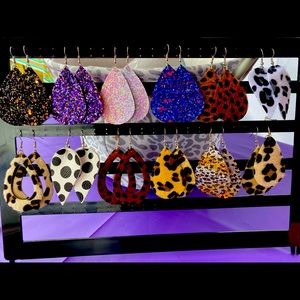 Earrings, car coasters, key chains, koozies